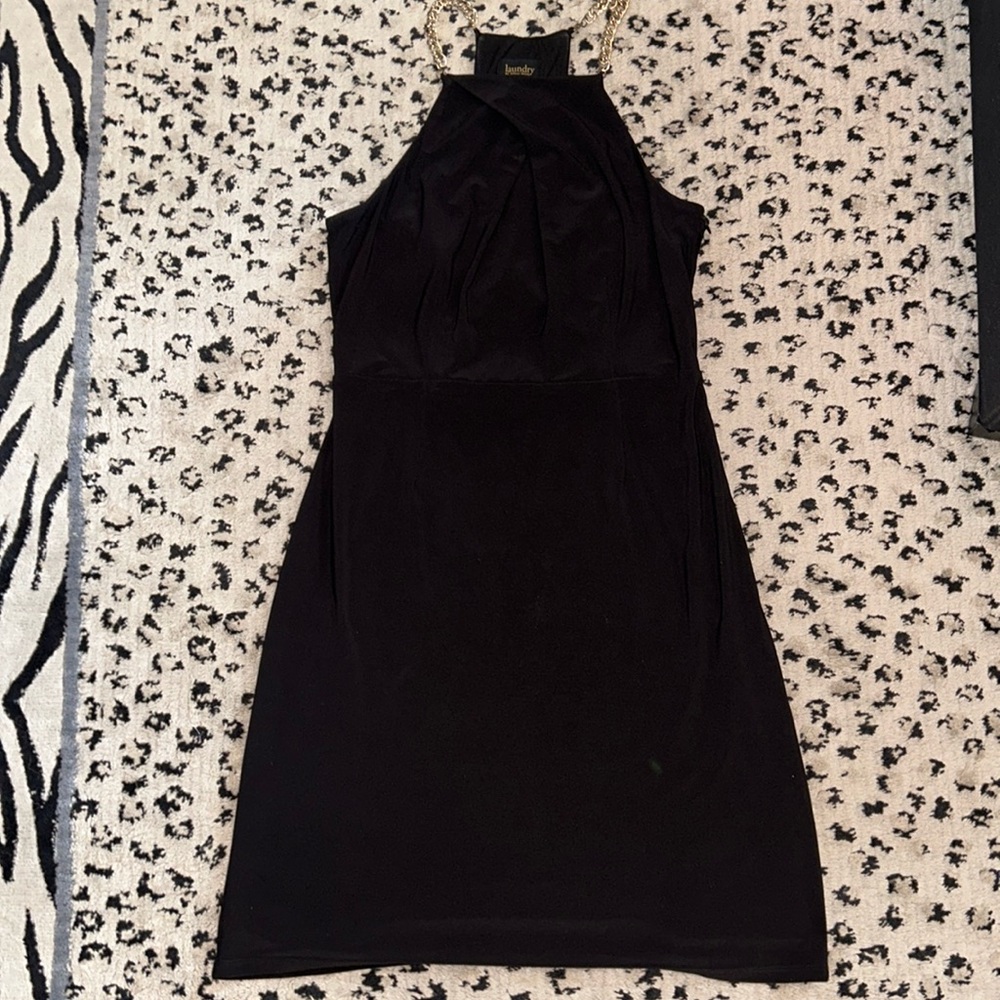 Chain neck open back black dress